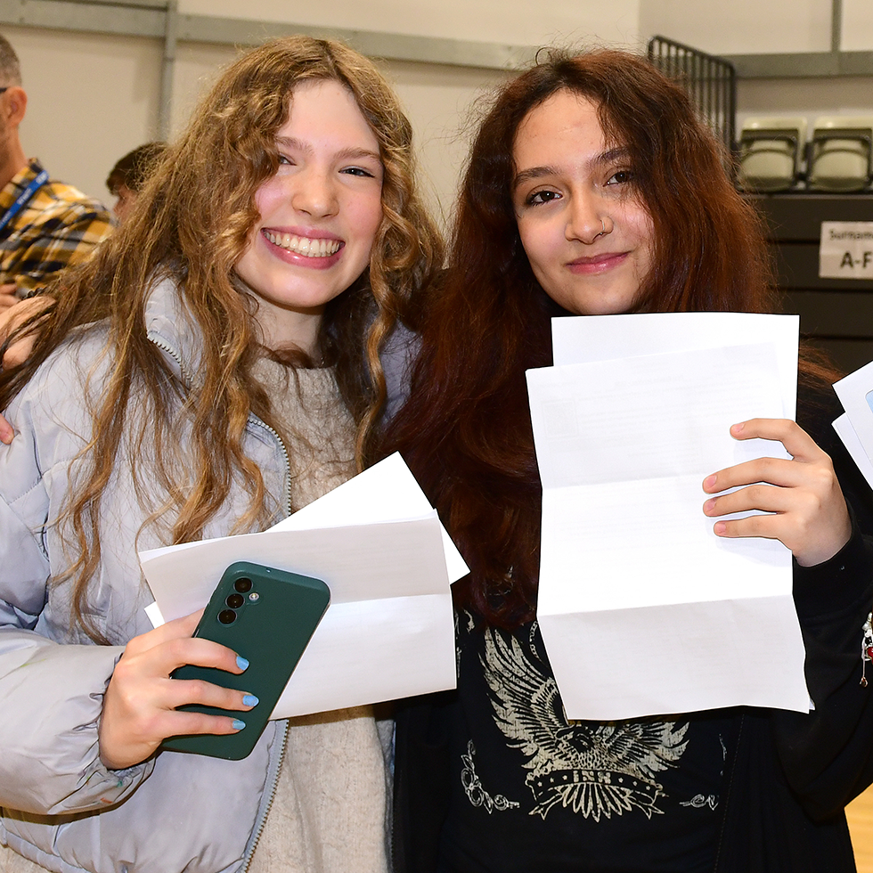 Image of students receiving exam results